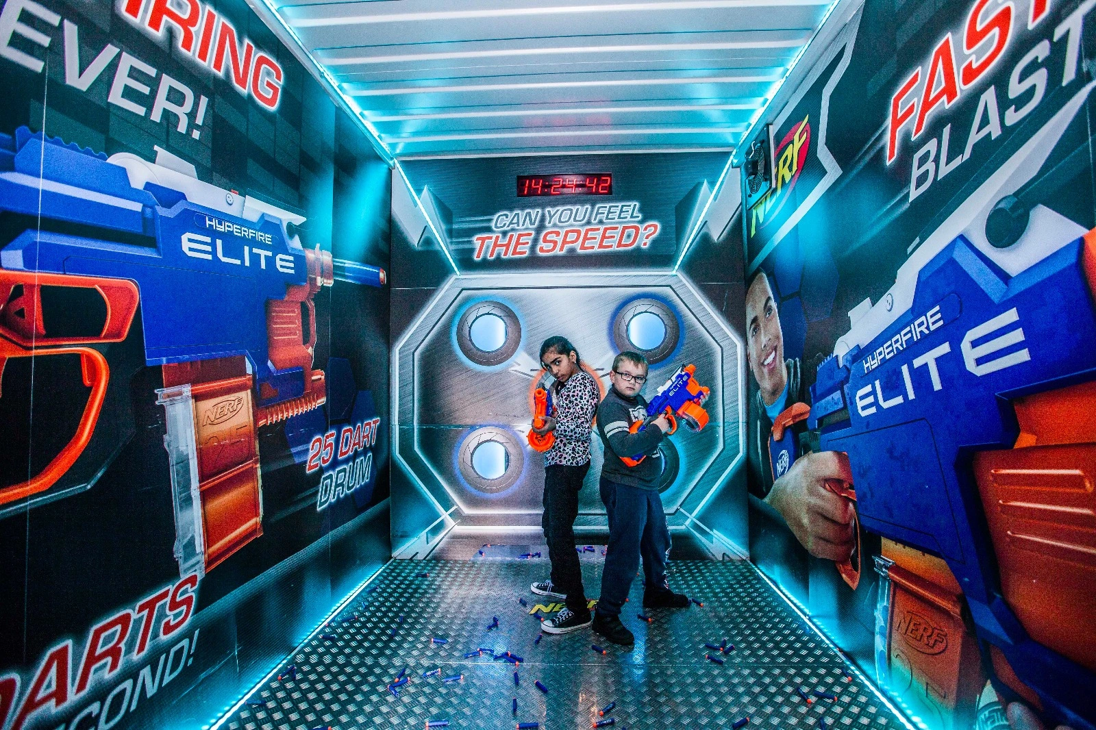 NERF Vault interior with branded walls, illuminated edges and target wall