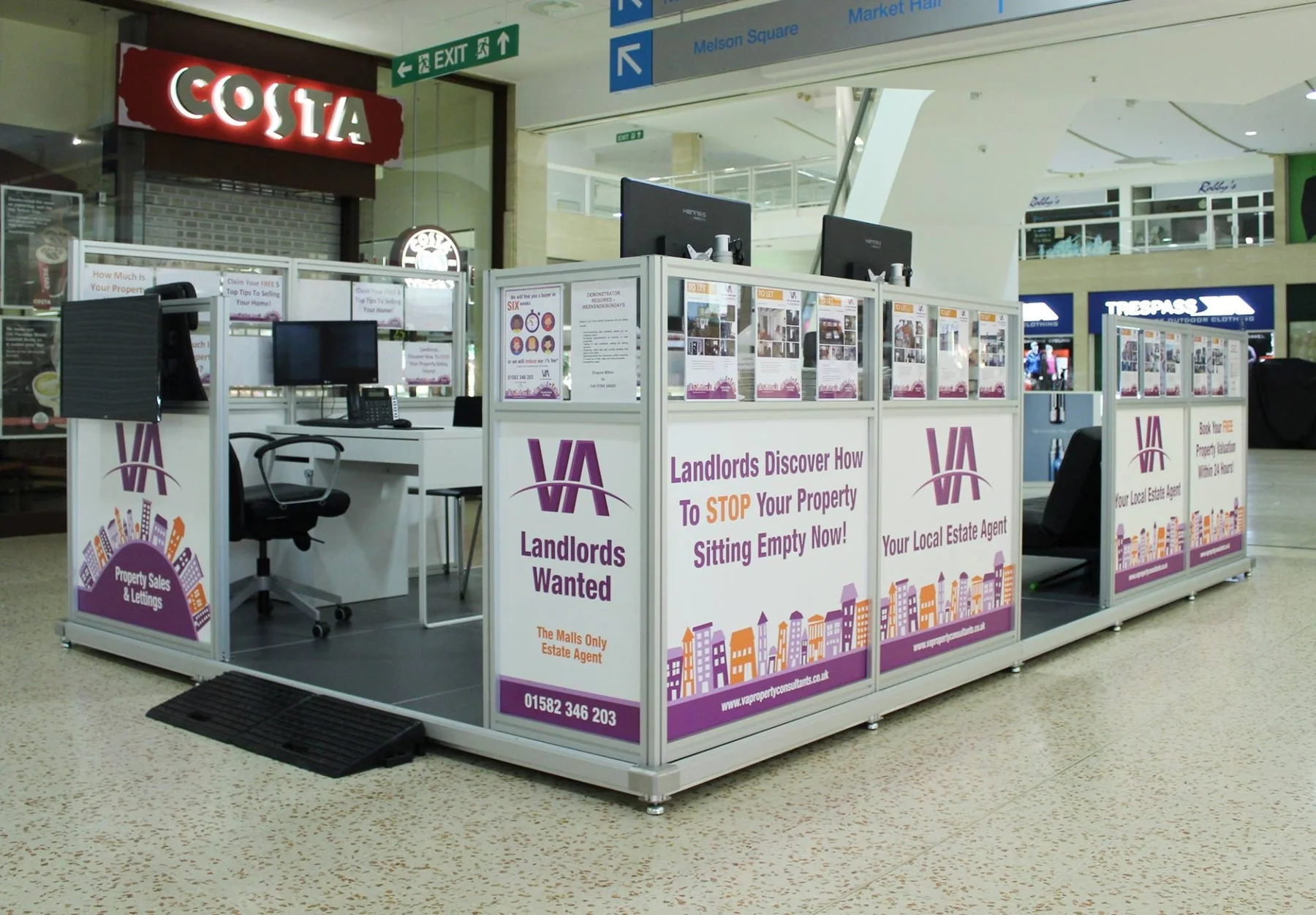 VA pop-up estate agency — branded panels and property listings